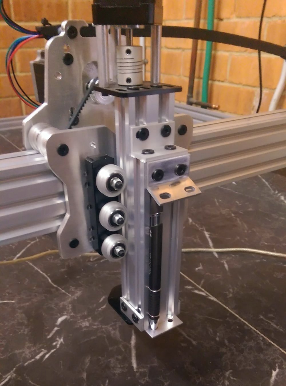 Photo of the pen holder attached to the CNC