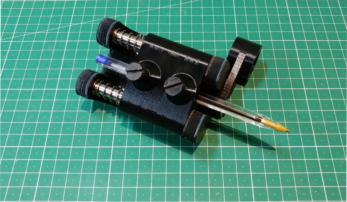 Assembled pen holder